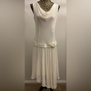 Beautiful Soft Flowing chiffon hip accented party dress.